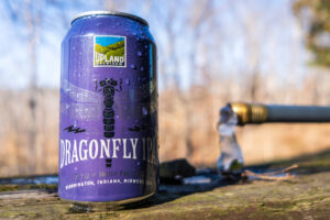 Dragonfly IPA in a field