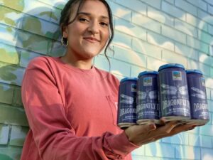 Girl holding Dragonfly IPA